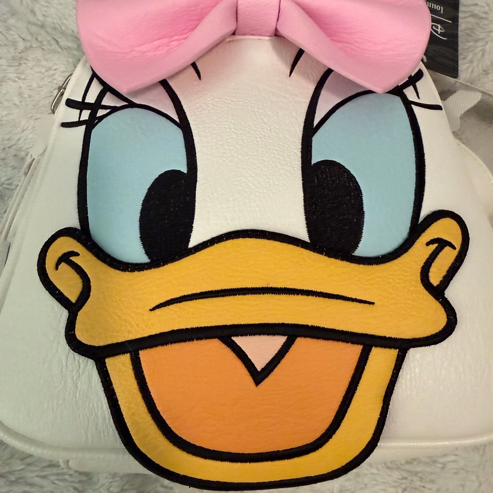 Reversible Donald & Daisy Loungefly backpack/crossbody. - Picture 12 of 13